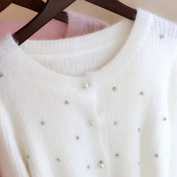 Πολύ χαριτωμένο γιλέκο και μαργαριτάρι ροζ στο μωρό ροζ χρώμα