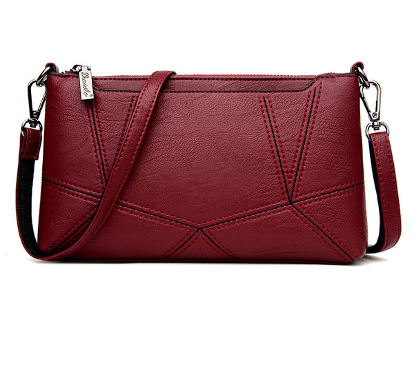 Σύγχρονη γυναικεία μανσέτα με φερμουάρ και μακρά λαβή ώμου