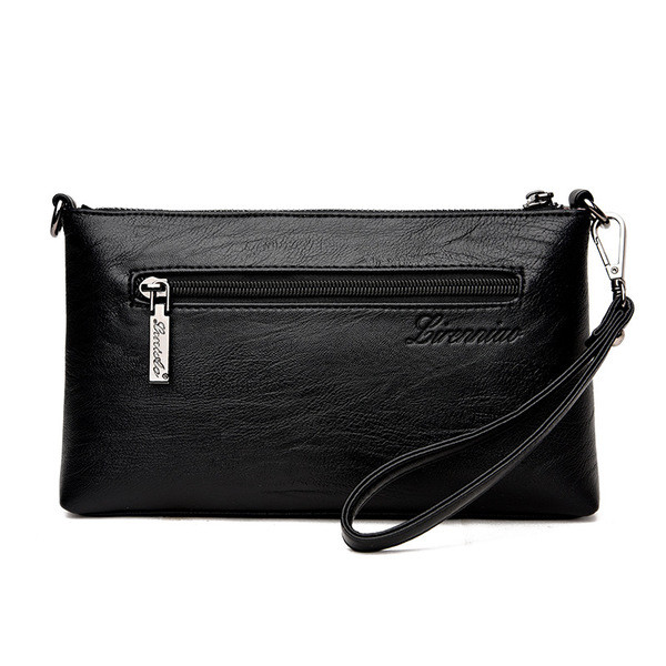 Σύγχρονη γυναικεία μανσέτα με φερμουάρ και μακρά λαβή ώμου