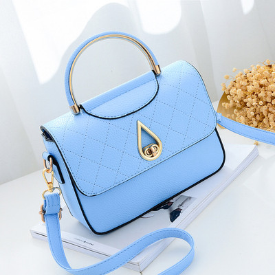 Καθημερινή συμπαγής τσάντα για γυναίκες με μη συνηθισμένη πόρπη και μακρά λαβή