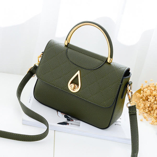 Καθημερινή συμπαγής τσάντα για γυναίκες με μη συνηθισμένη πόρπη και μακρά λαβή