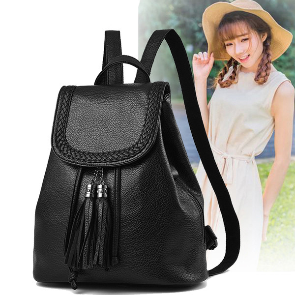 Δερμάτινο σακίδιο με κρεμαστά φούντες για κυρίες