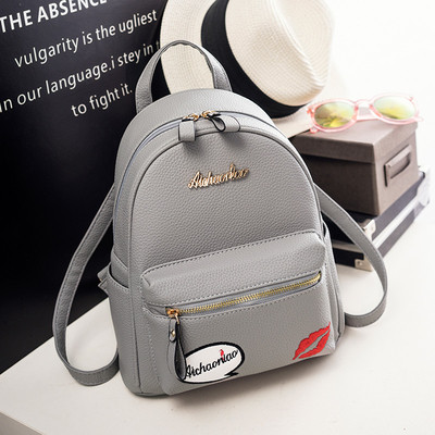 Καθημερινό δερμάτινο σακίδιο με ενδιαφέρουσα πολύχρωμη εφαρμογή