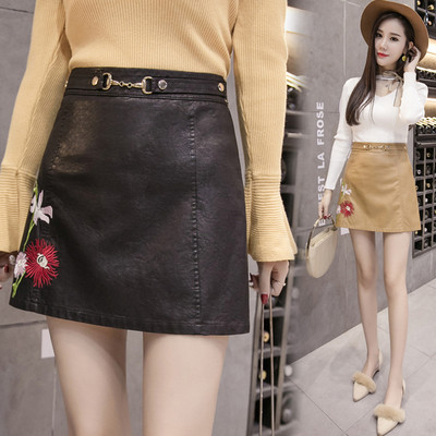 Κυρίες δερμάτινη φούστα με ενδιαφέρουσα εφαρμογή και ζώνη σε τρία χρώματα