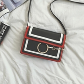 Καθημερινά τσάντα με μακριά λαβή και μια πολύ ενδιαφέρουσα κούμπωμα