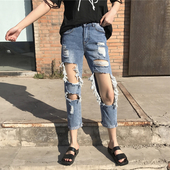 Γυναικεία τζιν με σχισμένα γόνατα και ψηλή μέση