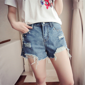 Страхотни дънкови дамски панталони с ресни и мъниста по джобовете