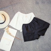 Σύντομη ελαστική κυρίες παντελόνι με λεπτομέρειες δαντέλα σε μαύρο και άσπρο