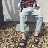 Κομψή κάνει παντελόνι τζιν κατακερματισμένη αρσενικό