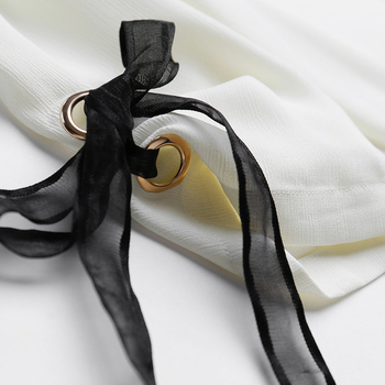 Стилна дамска блуза в бял цвят с оголени рамене и черна прозрачна част