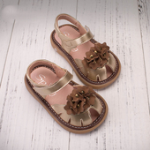 Παιδικά σανδάλια για τα κορίτσια σε χρυσό και μπλε διακόσμηση λουλούδι