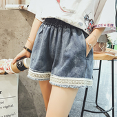 Κομψή ευρεία σορτς για τις γυναίκες και λάστιχο στη μέση-