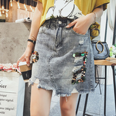 Κομψό κυρίες φούστα με ψηλή μέση και διακόσμηση - πούλιες