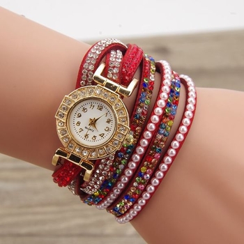 Много интересен дамски часовник тип гривна с лъскави,шарени камъчета за украса