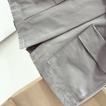 Стилен дамски къс панталон с колан и дълбоки джобове