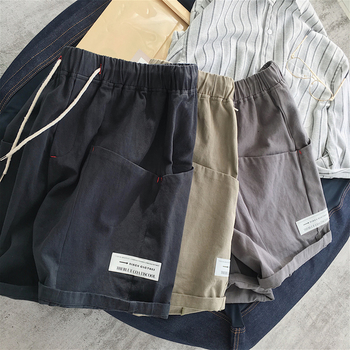 Широки мъжки шорти с връзки, в три цвята и с джобове