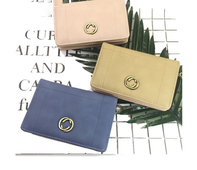 Красиво дамско портмоне в шест цвята с малка метална декорация