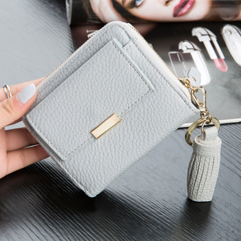 Красив мини дамски портфейл с пискюл в свежи цветове