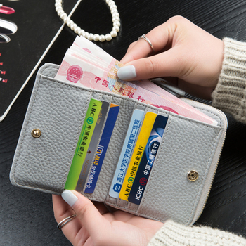 Красив мини дамски портфейл с пискюл в свежи цветове