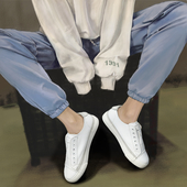 Γυναικεία πάνινα παπούτσια με λευκούς και μαύρους δεσμούς