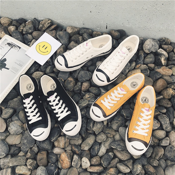 Κομψά ανδρικά πάνινα παπούτσια σε μαύρο, λευκό και κίτρινο χρώμα