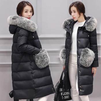 Много стилно зимно яке за дамите в дълъг модел, с качулка и пух