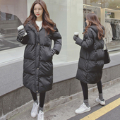 Ζεστό και άνετο χειμωνιάτικο γυναικείο μπουφάν με κουκούλα σε καθαρό μοτίβο