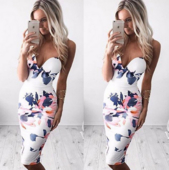 Изключителна рокля с V-образно,изрязано деколте и флорални мотиви