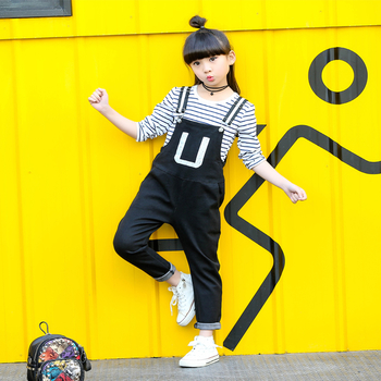 Κομψό παιδικό ολόσωμο για κορίτσια σε μαύρο χρώμα με τιράντες ελεύθερου στυλ
