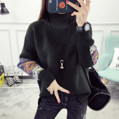 Χειμερινό γυναικείο πουλόβερ  με πολύχρωμο μανίκι και κολάρο  σε ευρύ σχέδιο