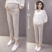 Κομψά παντελόνια 7/8 για έγκυες γυναίκες σε μαύρο και μπεζ χρώμα