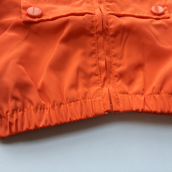 Καθημερινό παιδικό μπουφάν για αγόρια σε πράσινο και πορτοκαλί χρώμα