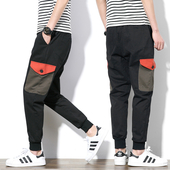 Αθλητικά αντρικά παντελόνια σε ευρύ σχέδιο με τσέπες