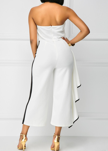 Κομψές και ευάερες γυναικείες φόρμες με μήκος 7/8 σε λευκό με πέπλα