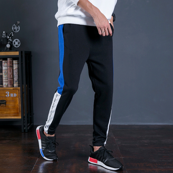 Αθλητικά αντρικά παντελόνια σε μαύρο χρώμα με χρωματιστές λωρίδες