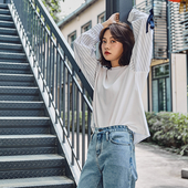 Κομψή γυναικεία μπλούζα με μανίκια και κορδέλα