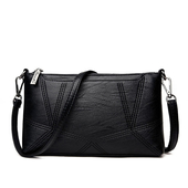 Σύγχρονη γυναικεία μανσέτα με φερμουάρ και μακρά λαβή ώμου